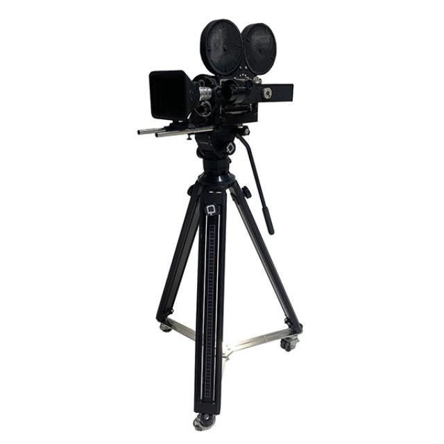 (33340078) MOVIE CAMERA - Mitchell Black Camera on Tripod w/ Castors